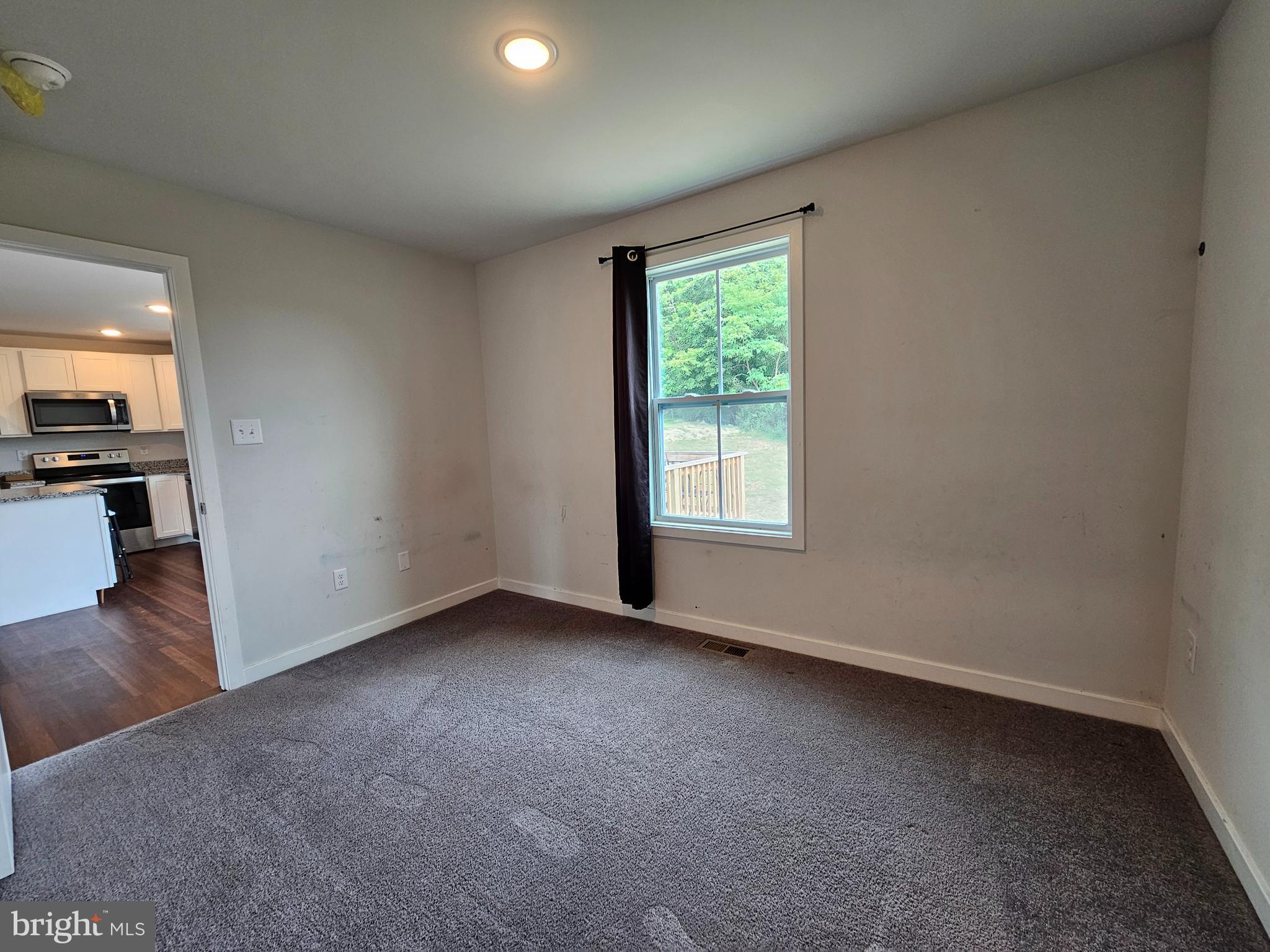 47 Bobbi Court Berkeley Springs, WV 25411 - Photo 16 of 22 an empty room with a window