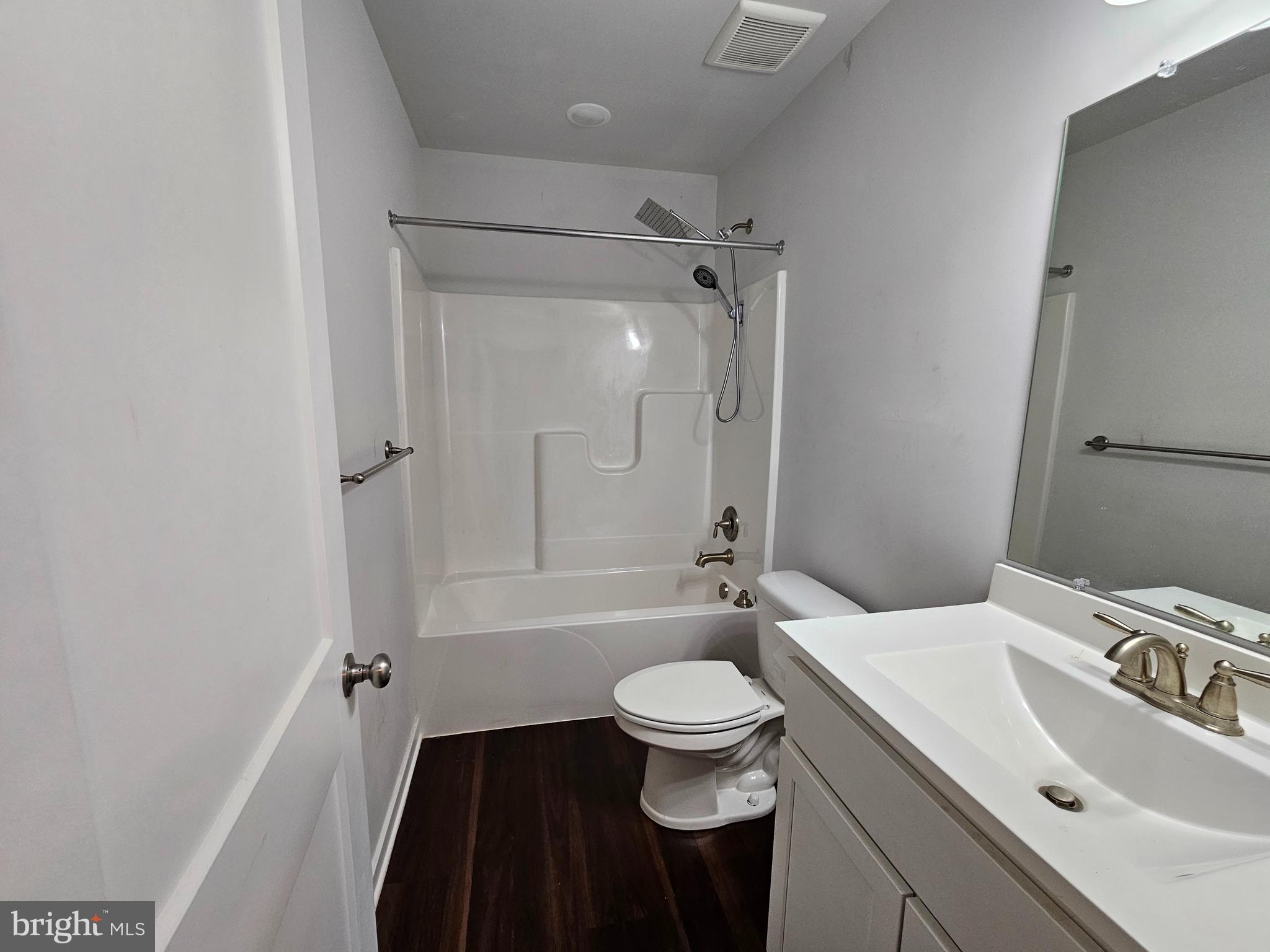 47 Bobbi Court Berkeley Springs, WV 25411 - Photo 19 of 22 a bathroom with a sink a toilet and shower
