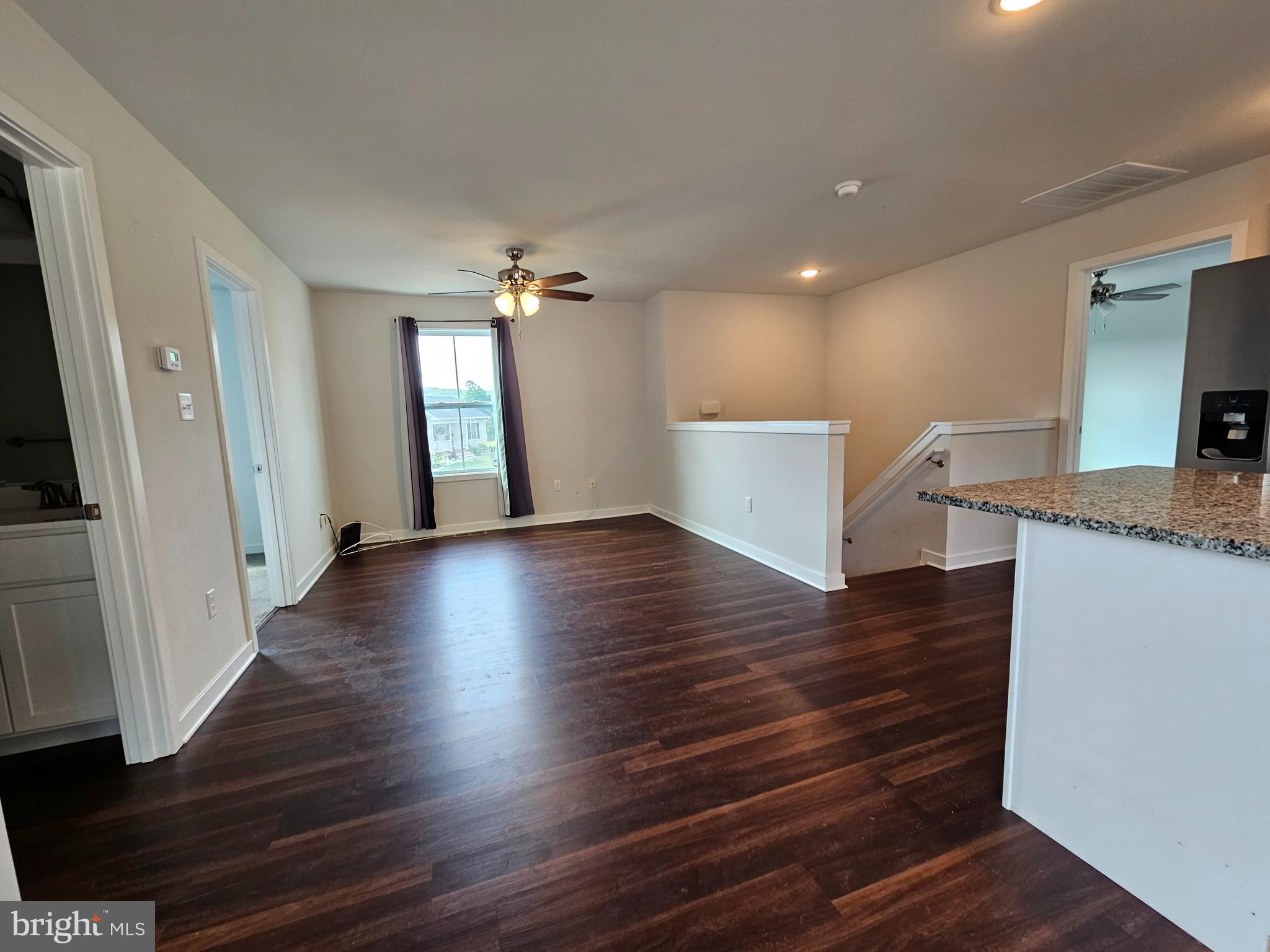 47 Bobbi Court Berkeley Springs, WV 25411 - Photo 8 of 22 a view of a kitchen cabinets and wooden floor