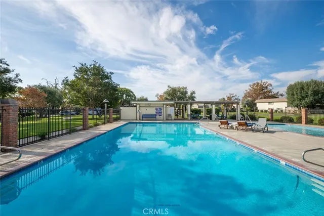 a view of a park with large trees