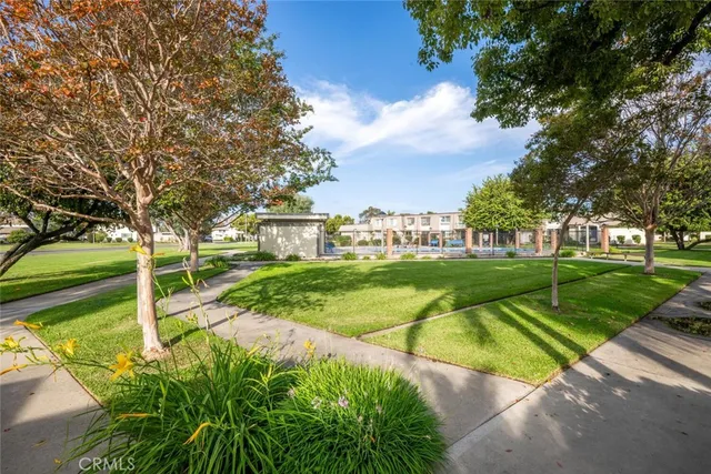 a view of a house with a big yard