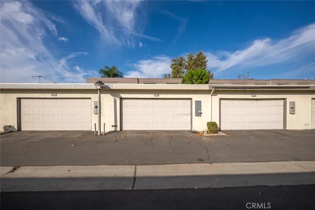 a view of a house with a street