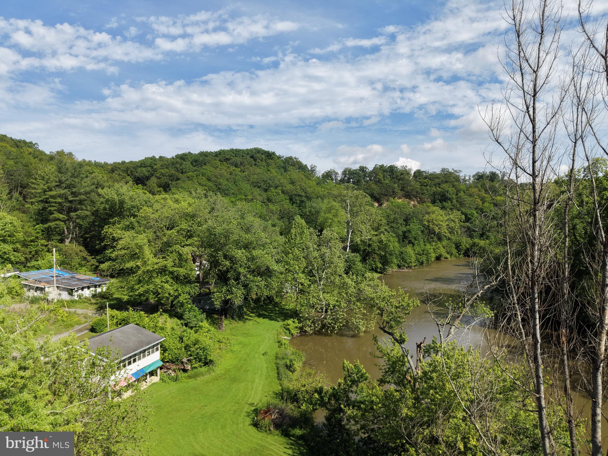 13726 Hopps Landing Road Hagerstown, MD 21740 - Photo 65 of 71 a view of a lake with green space