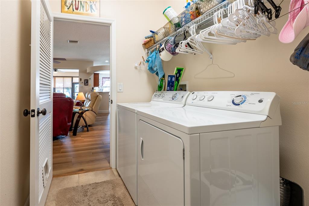 16222 Southwest 14th Avenue Road Ocala, FL 34473 - Photo 43 of 61 a utility room with dryer and washer