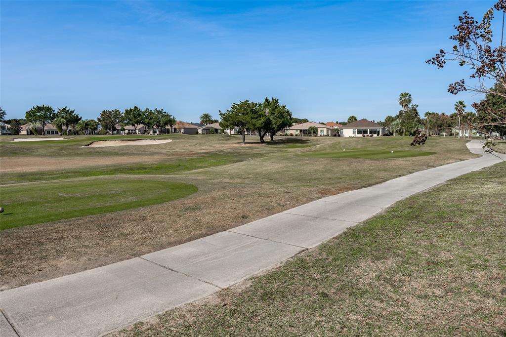 16222 Southwest 14th Avenue Road Ocala, FL 34473 - Photo 49 of 61 a view of building with ocean view