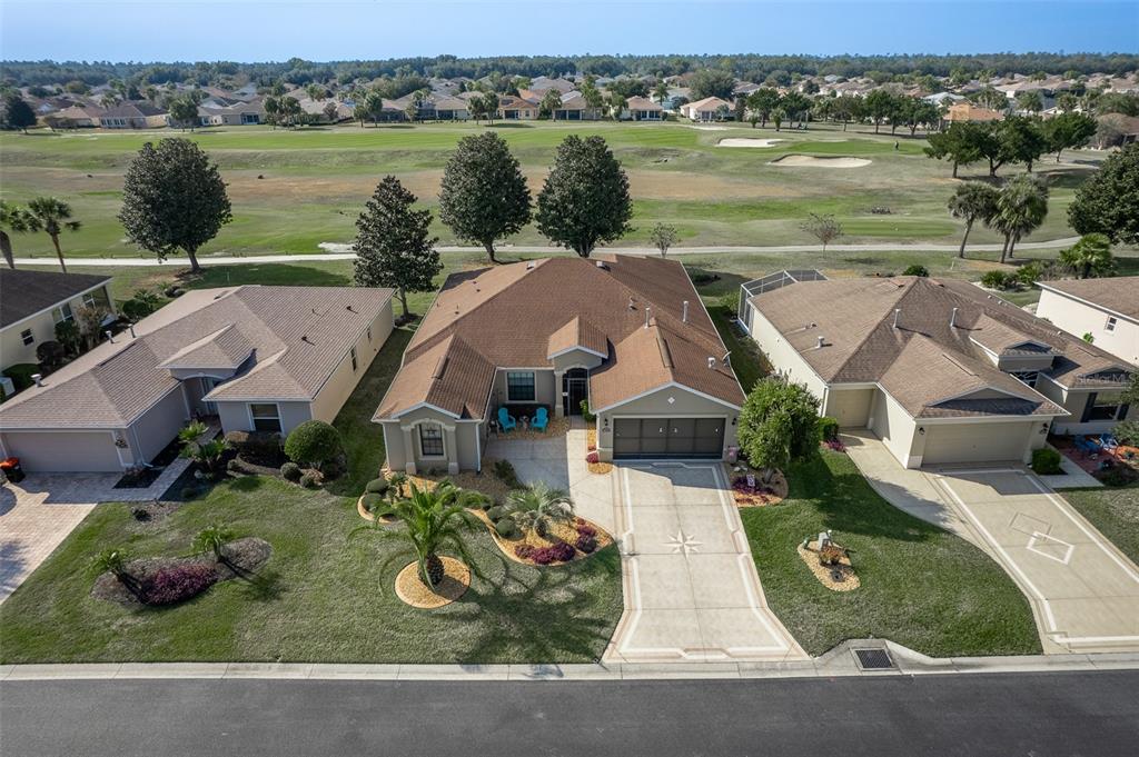 16222 Southwest 14th Avenue Road Ocala, FL 34473 - Photo 50 of 61 an aerial view of a house with garden space and lake view
