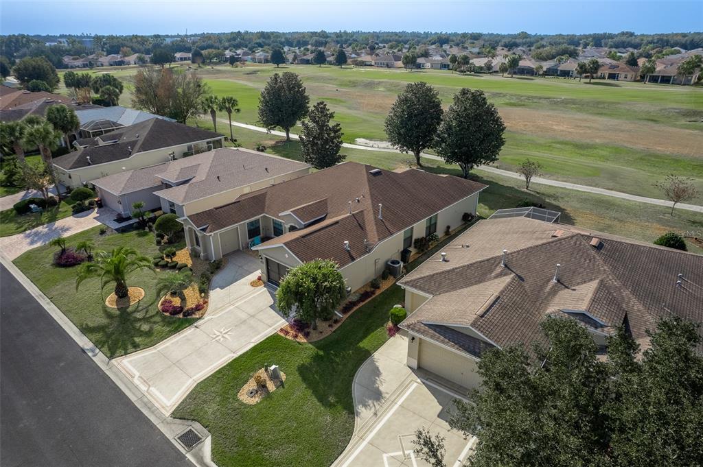 16222 Southwest 14th Avenue Road Ocala, FL 34473 - Photo 51 of 61 an aerial view of a house with garden space and lake view