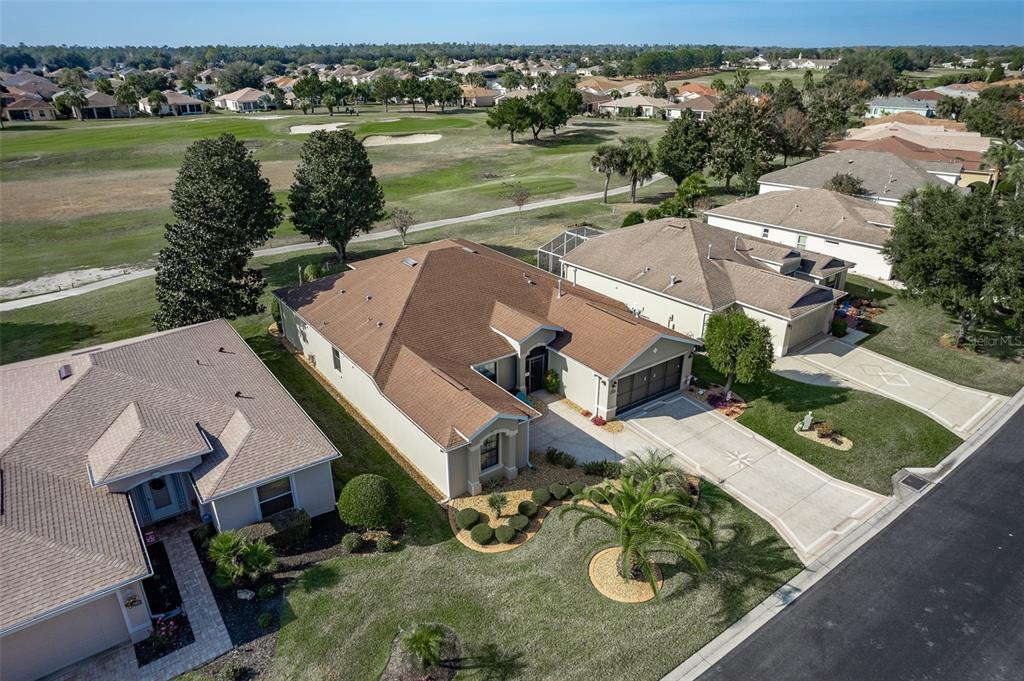 16222 Southwest 14th Avenue Road Ocala, FL 34473 - Photo 54 of 61 an aerial view of a house with outdoor space and lake view
