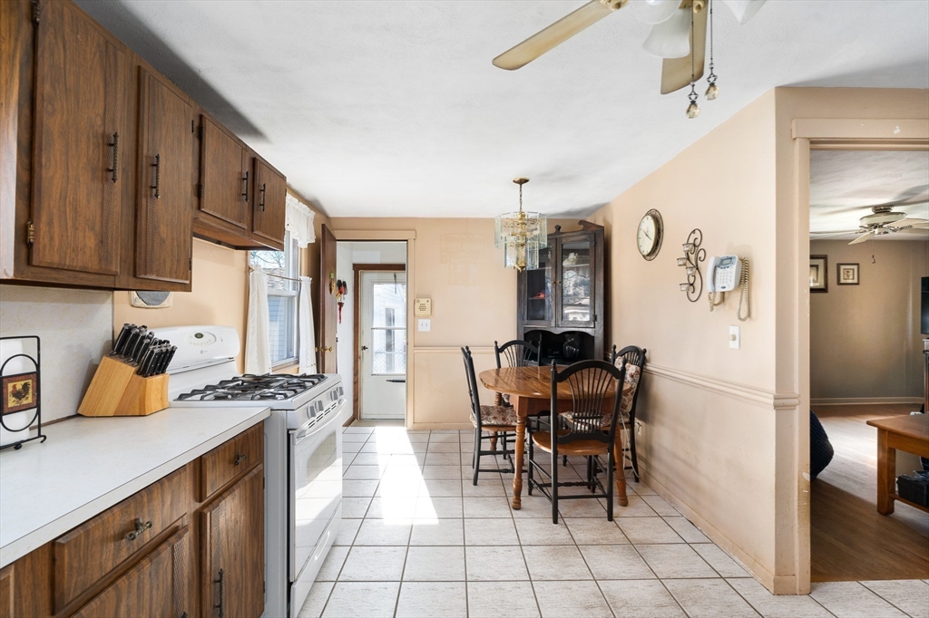 331 Grand Valley Road Springfield, MA 01128 - Photo 11 of 37 a kitchen with stainless steel appliances granite countertop a refrigerator and a stove