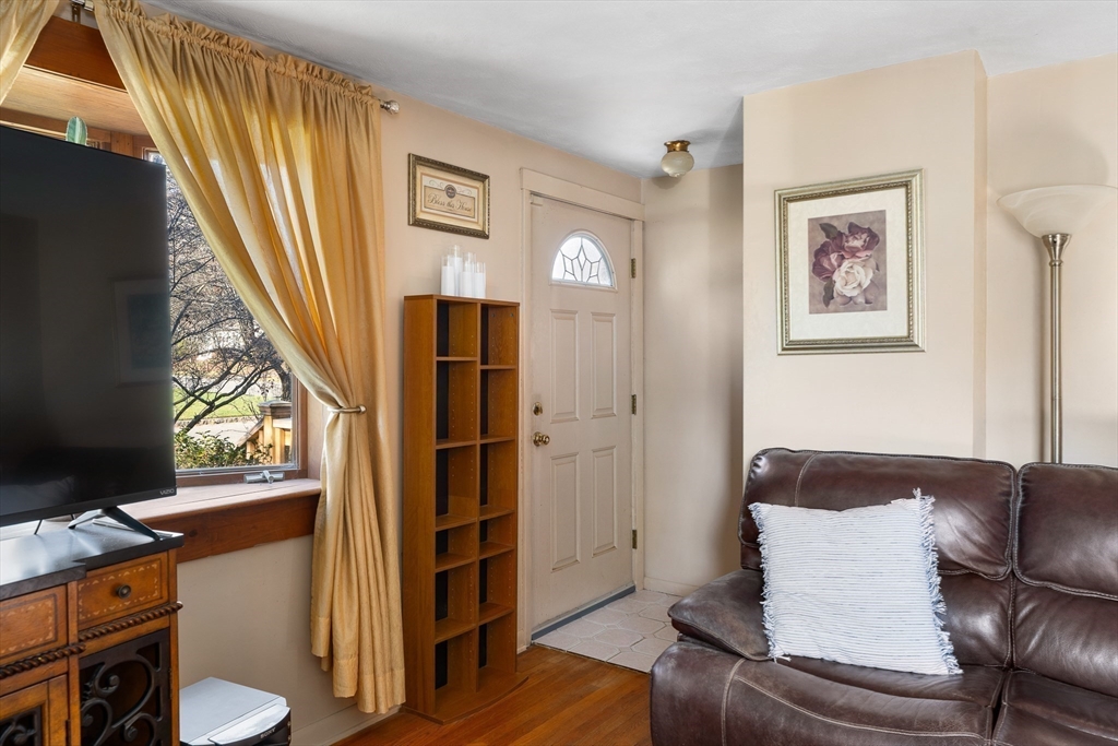 331 Grand Valley Road Springfield, MA 01128 - Photo 15 of 37 a living room with furniture and a window