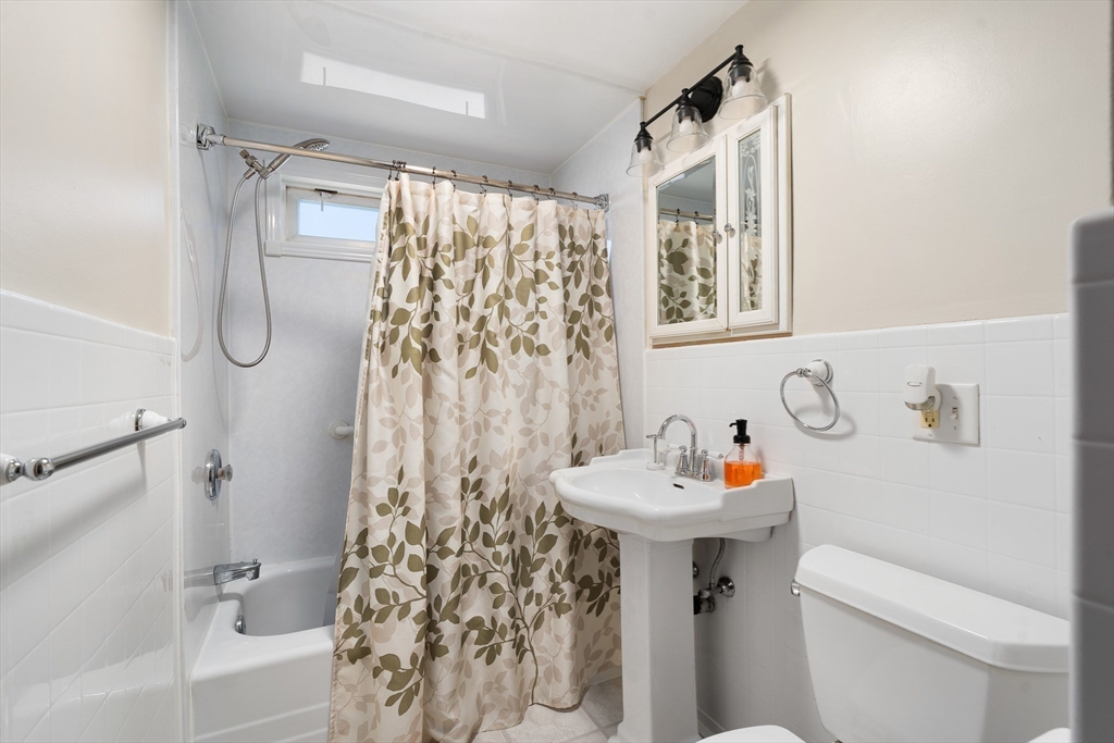 331 Grand Valley Road Springfield, MA 01128 - Photo 16 of 37 a bathroom with a sink toilet and shower