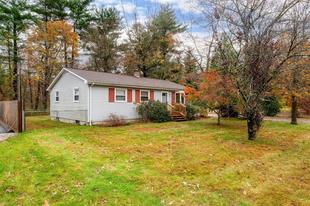 331 Grand Valley Road Springfield, MA 01128 - Photo 2 of 37 a view of a house with a yard and trees
