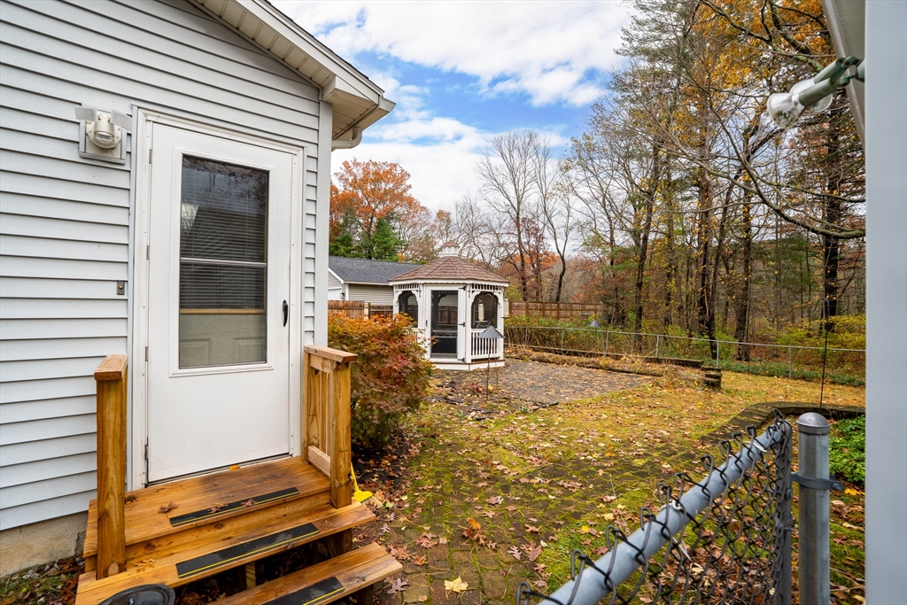 331 Grand Valley Road Springfield, MA 01128 - Photo 29 of 37 a view of a house with backyard and trees
