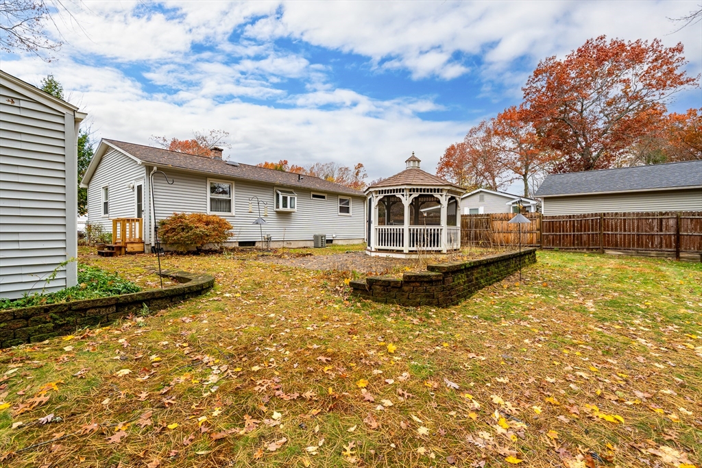 331 Grand Valley Road Springfield, MA 01128 - Photo 30 of 37 a front view of a house with garden