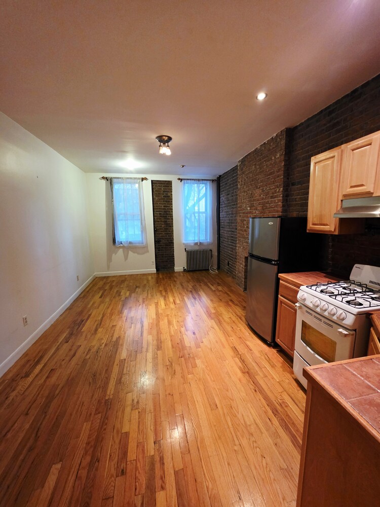 340 Atlantic Avenue, Unit 2L Brooklyn, NY 11201 - Photo 5 of 12 a view of a room with wooden floor