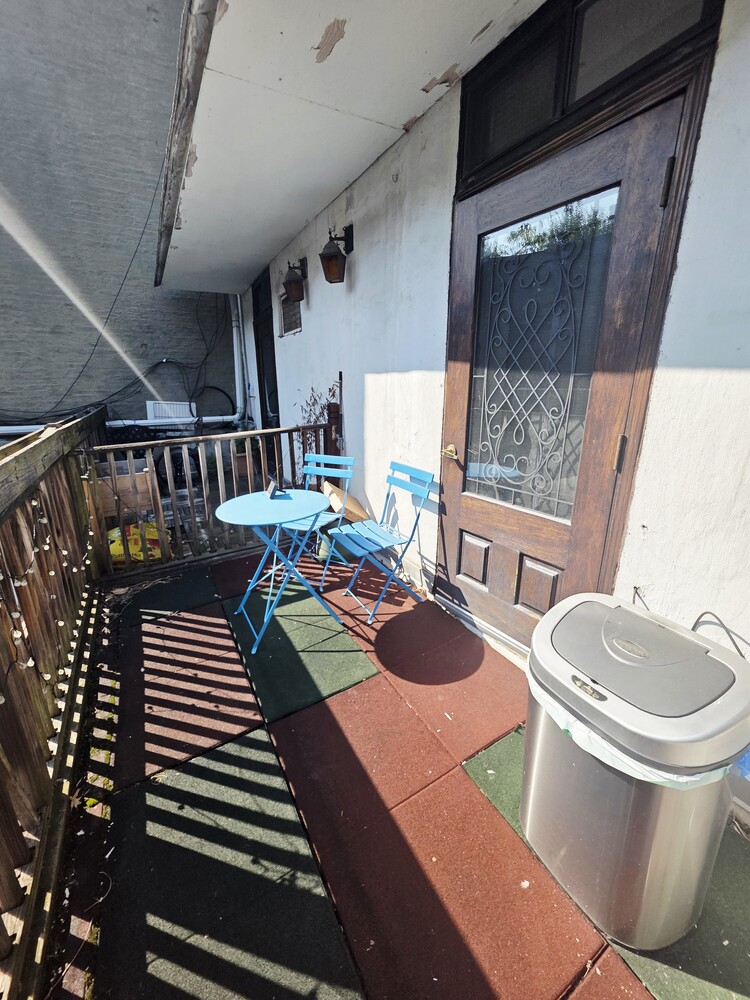 340 Atlantic Avenue, Unit 2L Brooklyn, NY 11201 - Photo 9 of 12 a balcony with chairs and a table