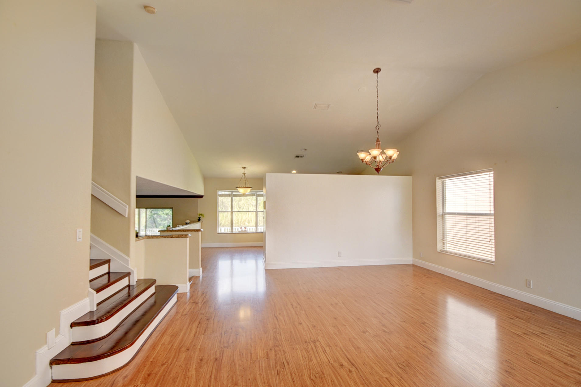 18098 Clear Brook Circle Boca Raton, FL 33498 - Photo 11 of 48 a view of a room with wooden floor and window