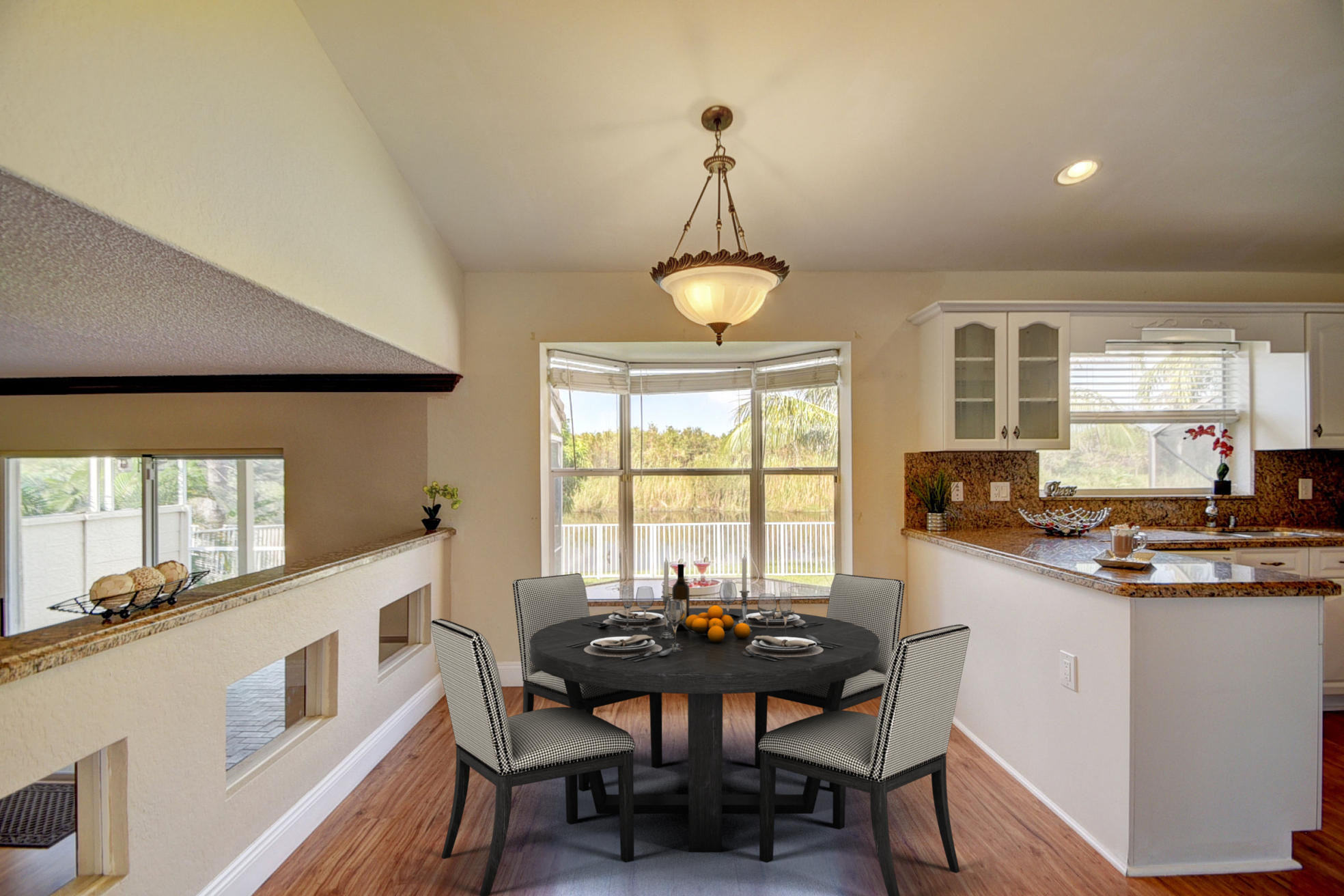 18098 Clear Brook Circle Boca Raton, FL 33498 - Photo 16 of 48 a view of a dining room with furniture window and outside view