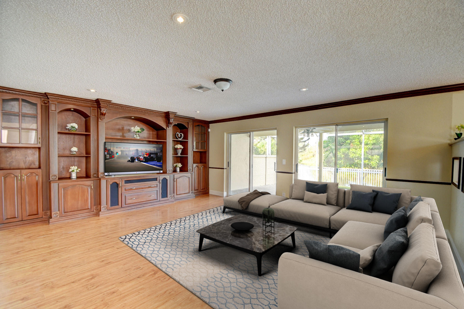 18098 Clear Brook Circle Boca Raton, FL 33498 - Photo 23 of 48 a living room with furniture and a flat screen tv