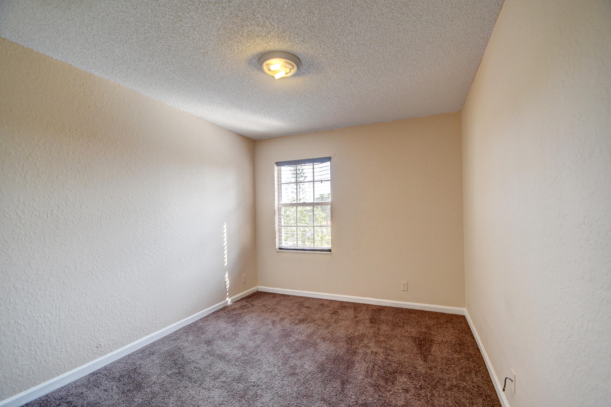 18098 Clear Brook Circle Boca Raton, FL 33498 - Photo 33 of 48 an empty room with windows