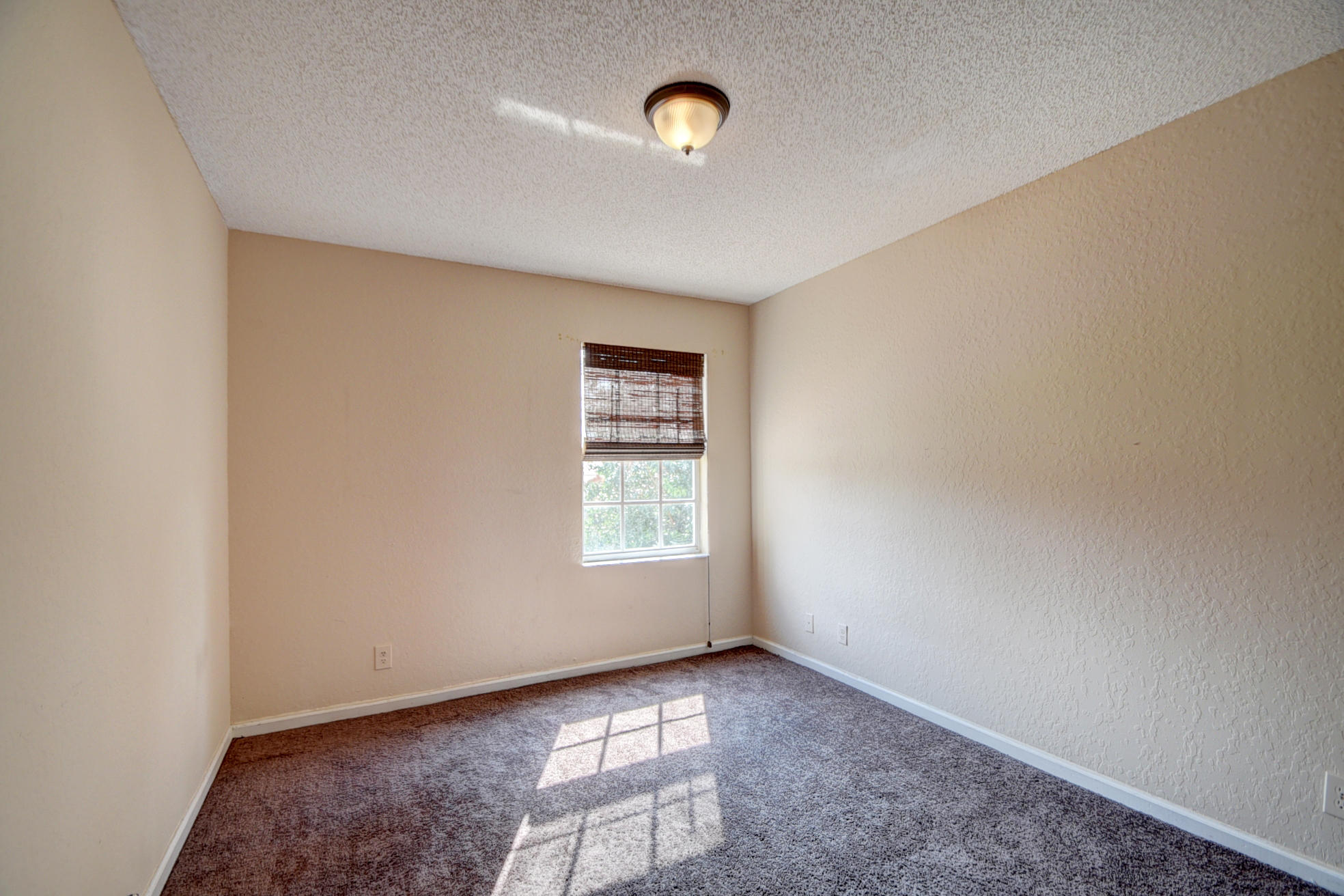 18098 Clear Brook Circle Boca Raton, FL 33498 - Photo 37 of 48 a view of an empty room with a window