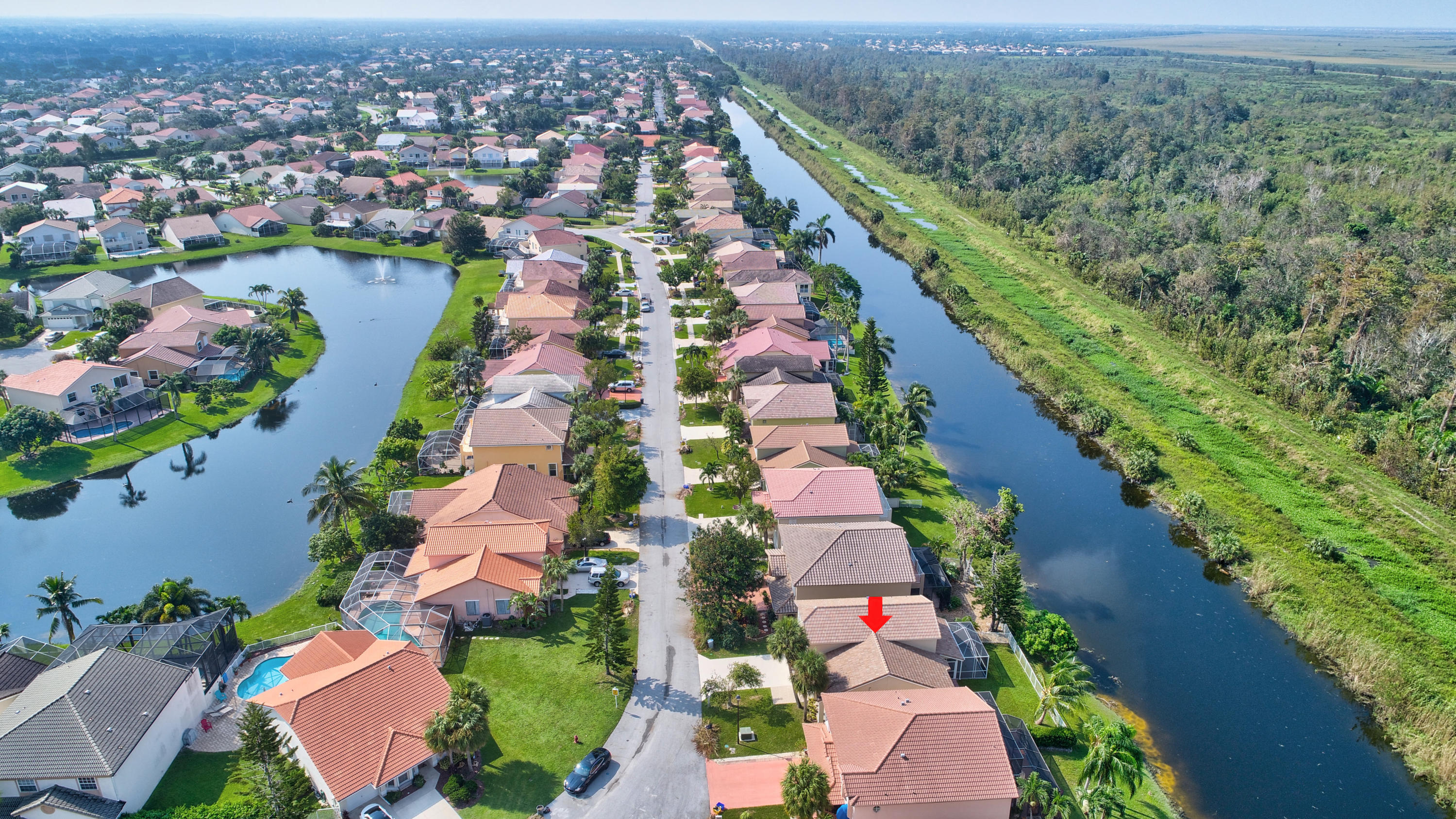 18098 Clear Brook Circle Boca Raton, FL 33498 - Photo 42 of 48 an aerial view of residential houses with outdoor space
