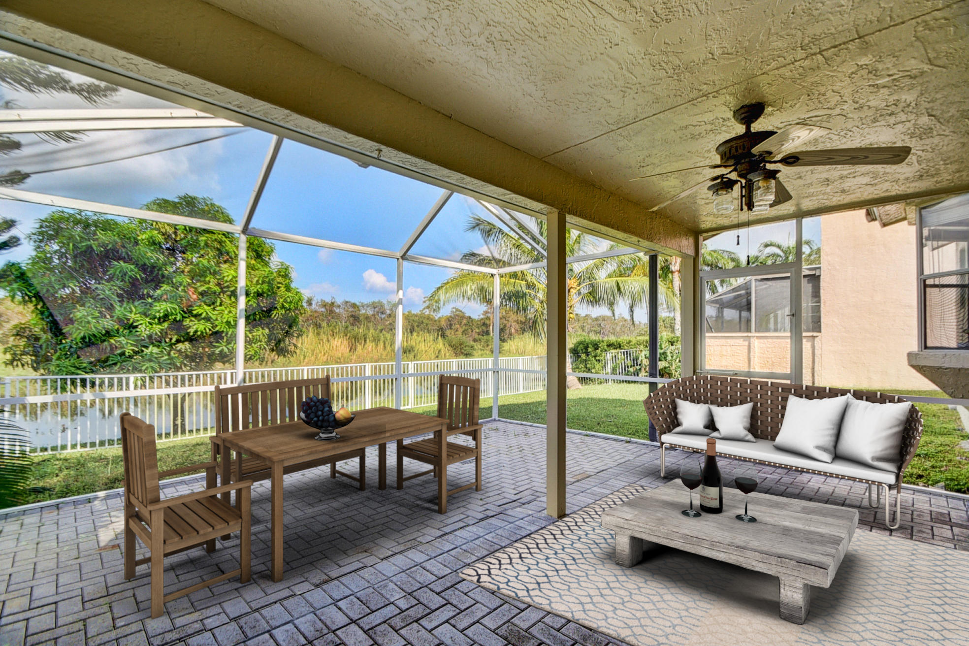 18098 Clear Brook Circle Boca Raton, FL 33498 - Photo 8 of 48 a living room with patio furniture and a floor to ceiling window