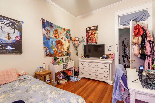 a bedroom with a bed and furniture