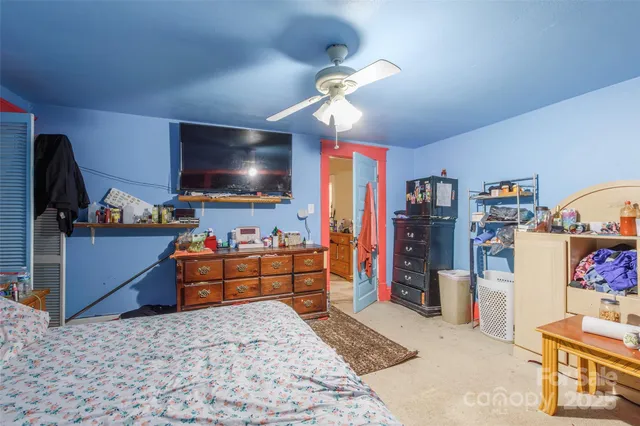 a room with furniture and a flat screen tv