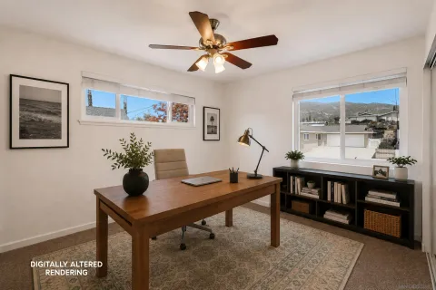 a view of a workspace with furniture