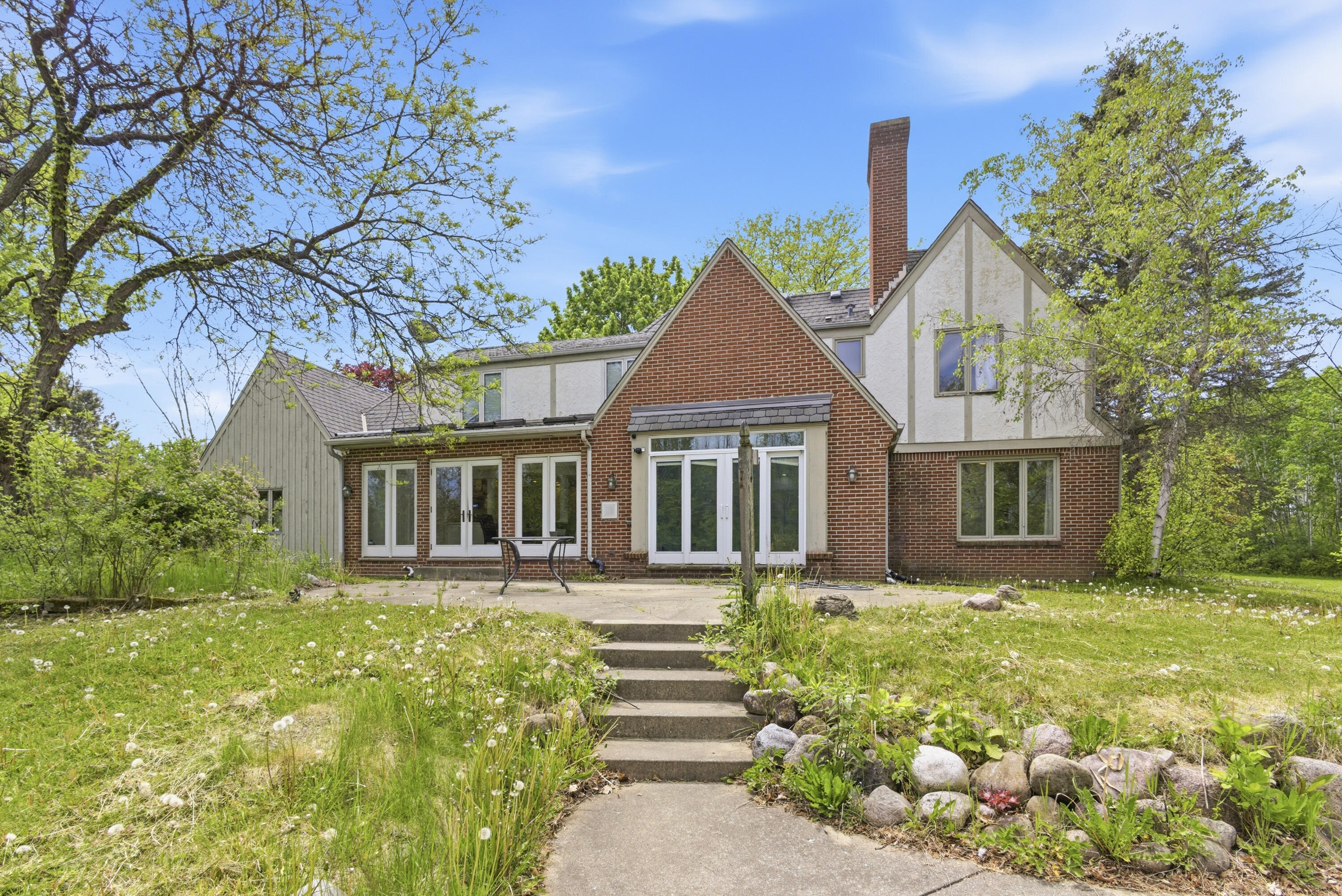 9090 North Green Brook Road River Hills, WI 53217 - Photo 3 of 53 Back