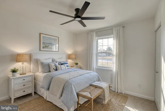 an empty room with a empty space and windows