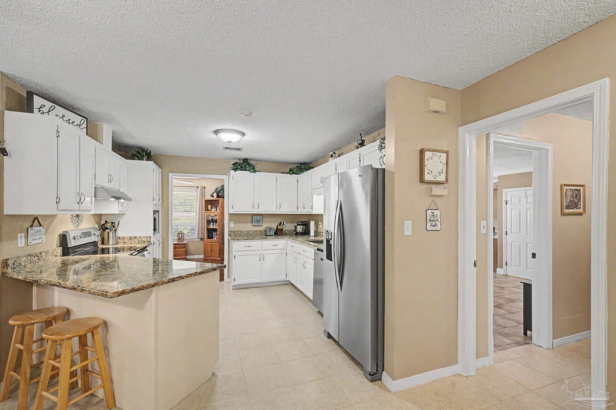 5601 Windermere Trace Pace, FL 32571 - Photo 15 of 69
