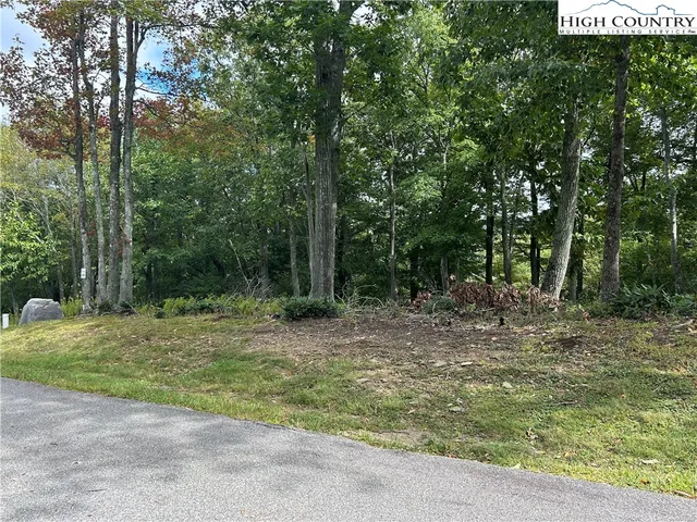 a fire hydrant in the middle of a field