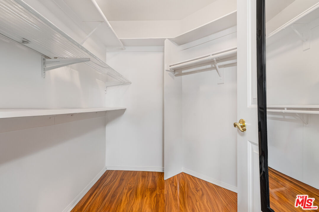 12963 West Runway Road, Unit 221 Playa Vista, CA 90094 - Photo 14 of 17 a view of walk in closet with empty racks