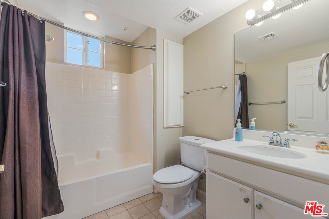 12963 West Runway Road, Unit 221 Playa Vista, CA 90094 - Photo 16 of 17 a bathroom with a sink toilet and shower