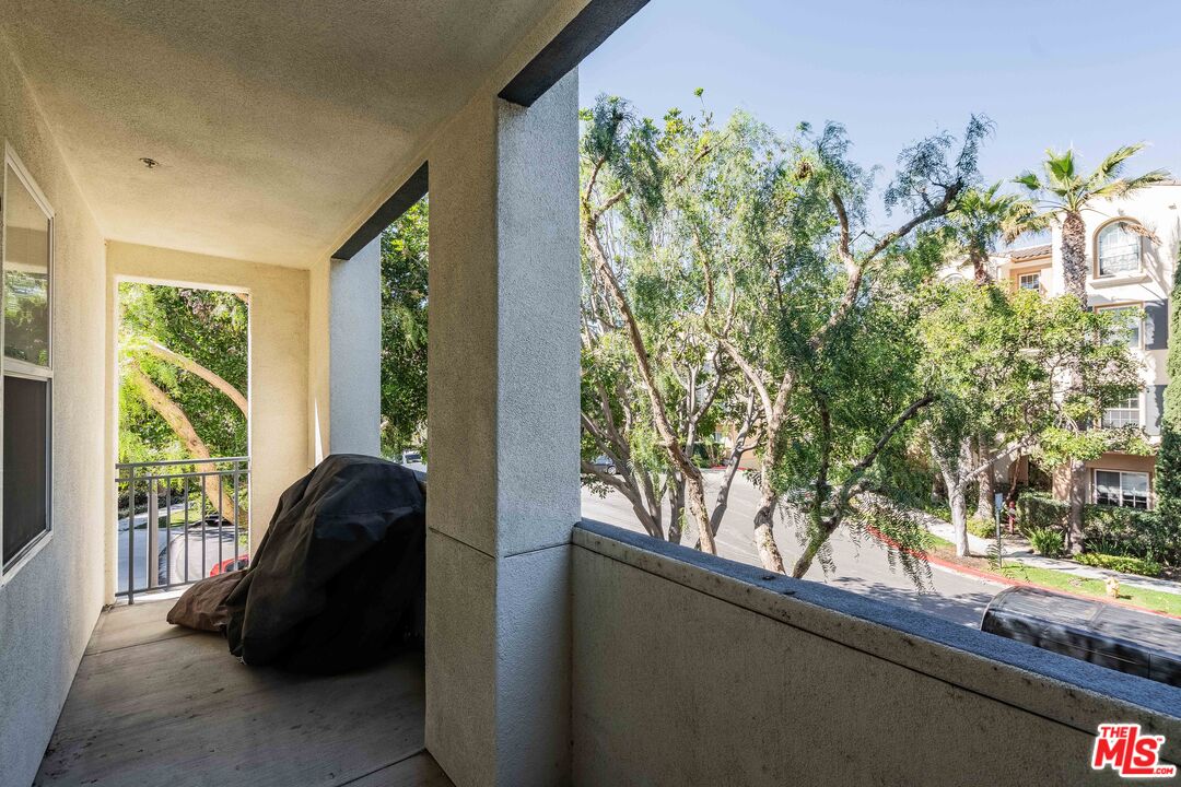 12963 West Runway Road, Unit 221 Playa Vista, CA 90094 - Photo 10 of 17 a living room with furniture and a potted plant