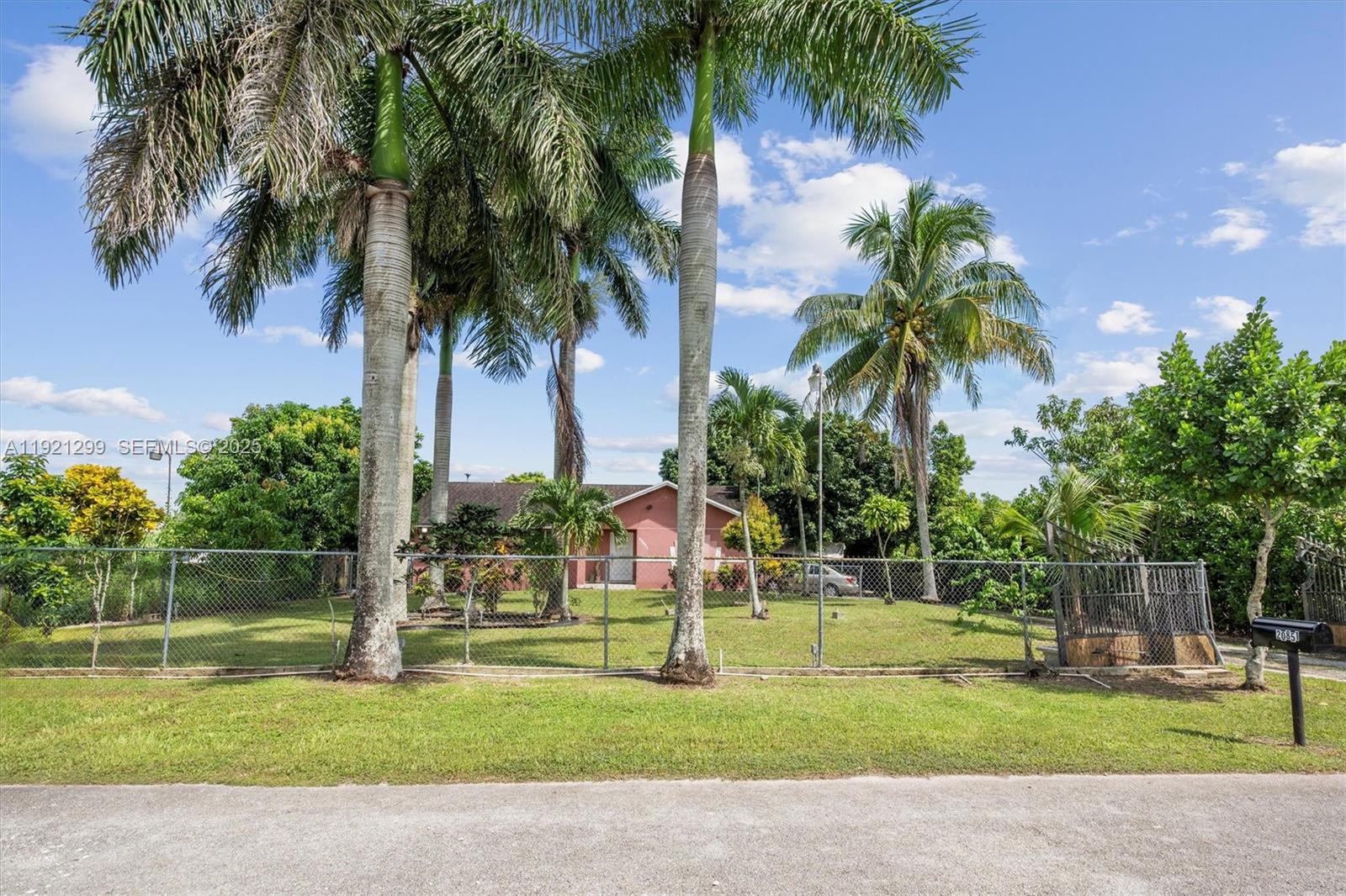 20851 Southwest 242nd Street Homestead, FL 33031 - Photo 2 of 42 a view of a park with palm trees