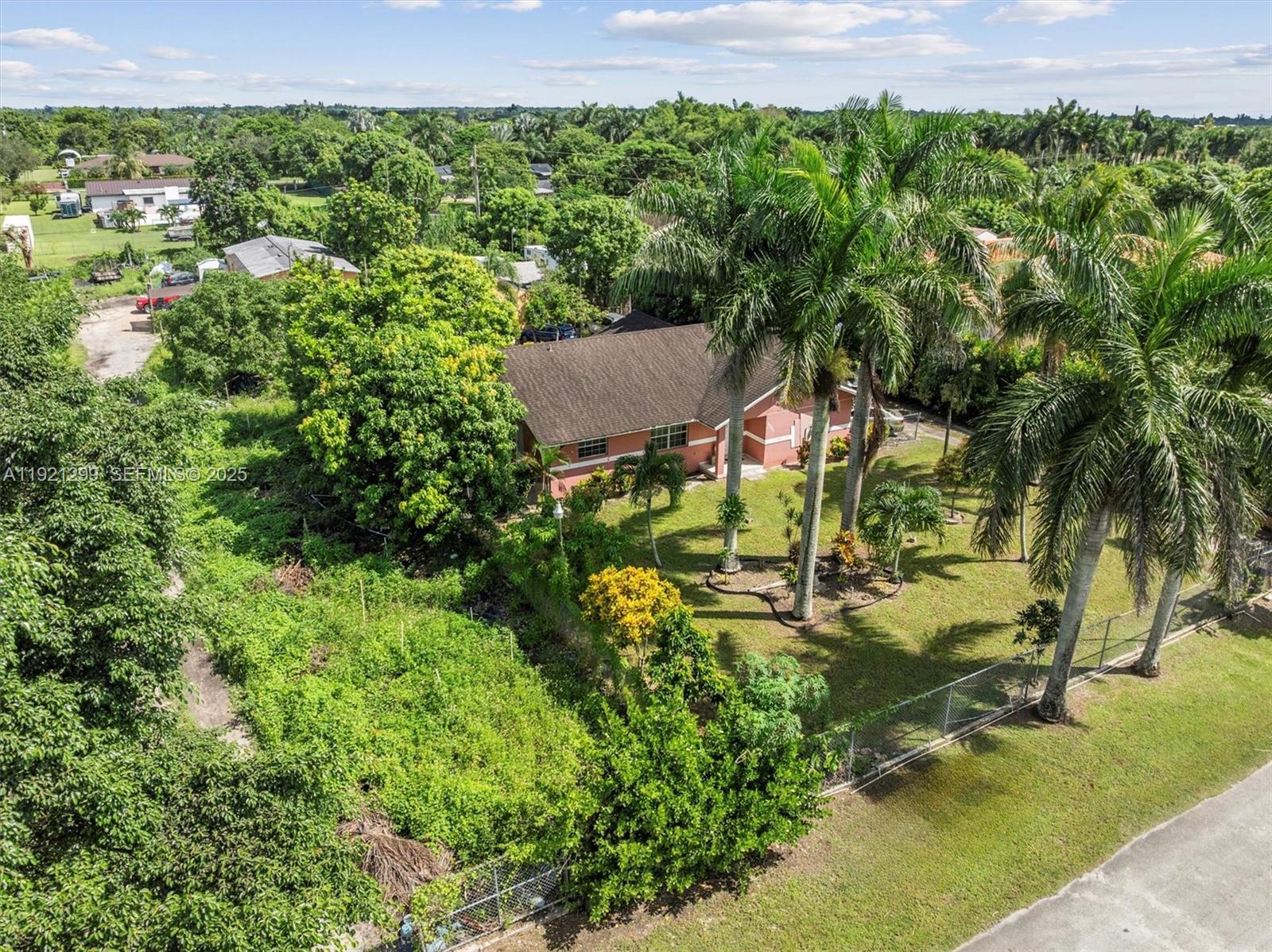 20851 Southwest 242nd Street Homestead, FL 33031 - Photo 40 of 42 a view of an outdoor space and a yard