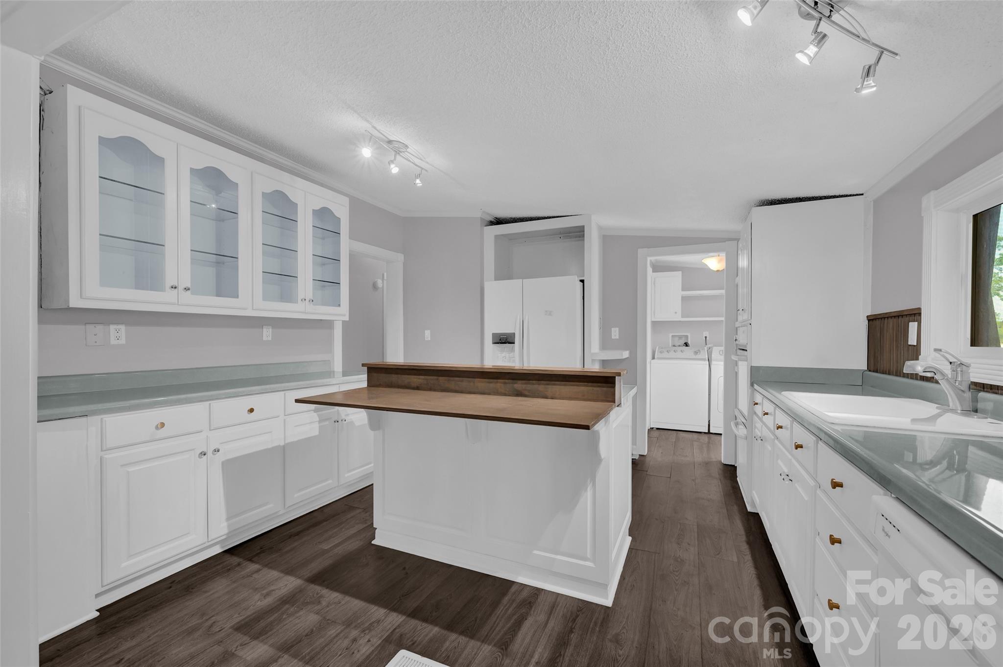 5708 Harwell Road Catawba, NC 28609 - Photo 13 of 31 a kitchen with granite countertop a sink stainless steel appliances and cabinets