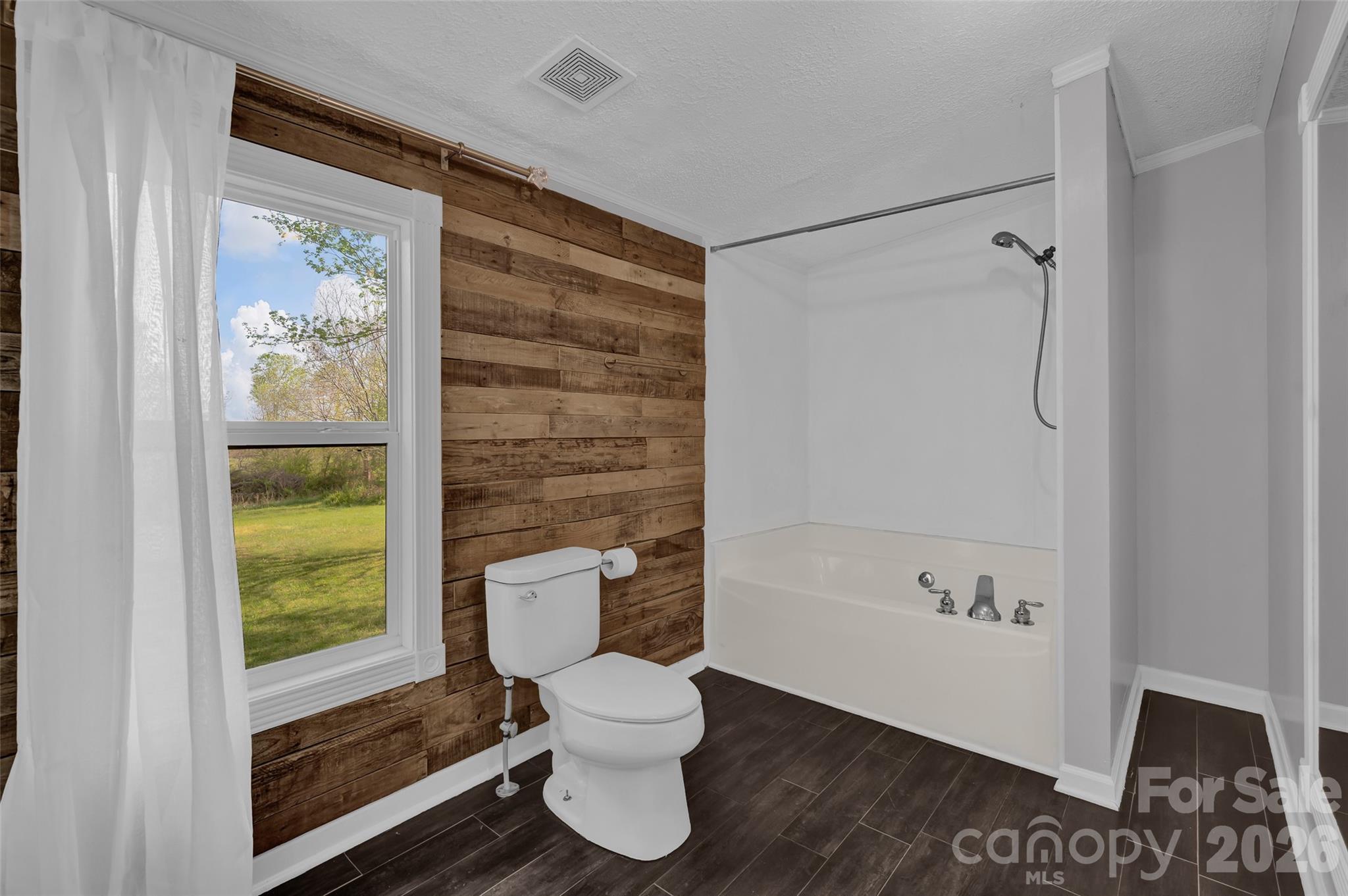 5708 Harwell Road Catawba, NC 28609 - Photo 19 of 31 a bathroom with a toilet and a shower