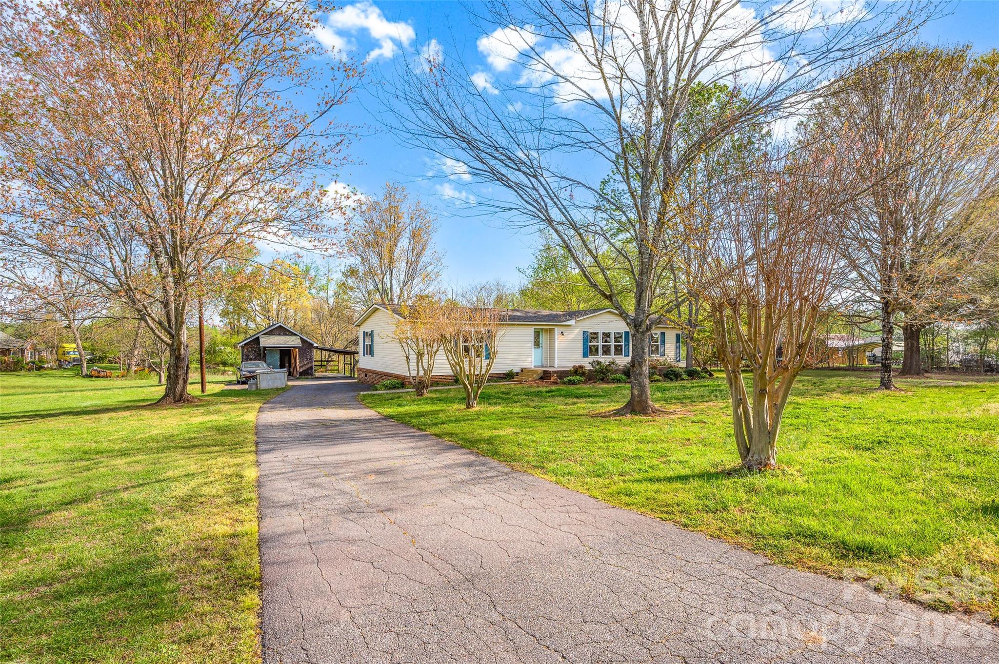 5708 Harwell Road Catawba, NC 28609 - Photo 2 of 31 a view of a park with large trees