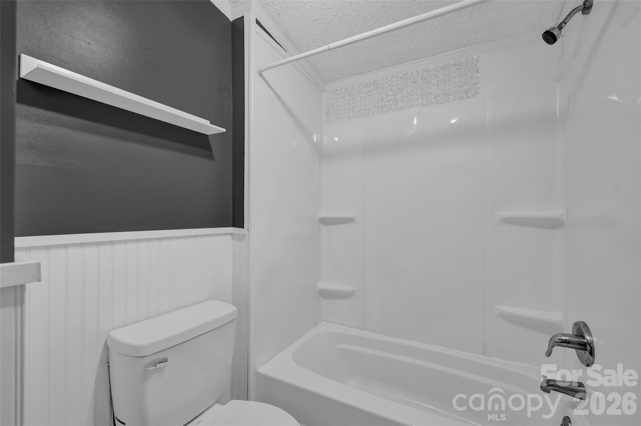 5708 Harwell Road Catawba, NC 28609 - Photo 23 of 31 a bathroom with a toilet and a bathtub
