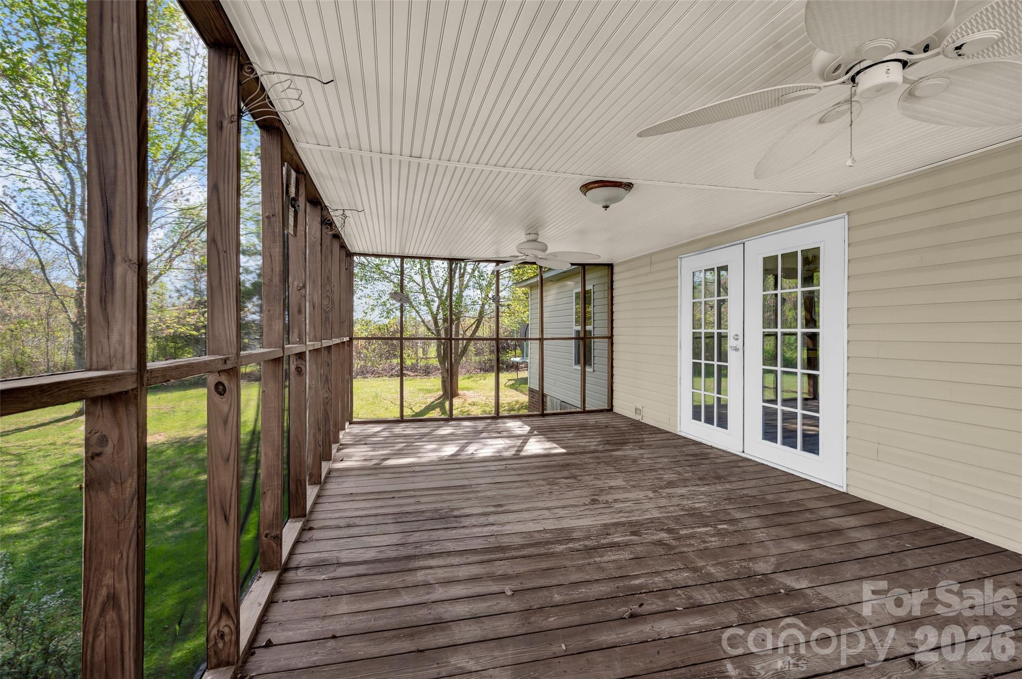 5708 Harwell Road Catawba, NC 28609 - Photo 24 of 31 a view of an empty room with wooden floor and a window