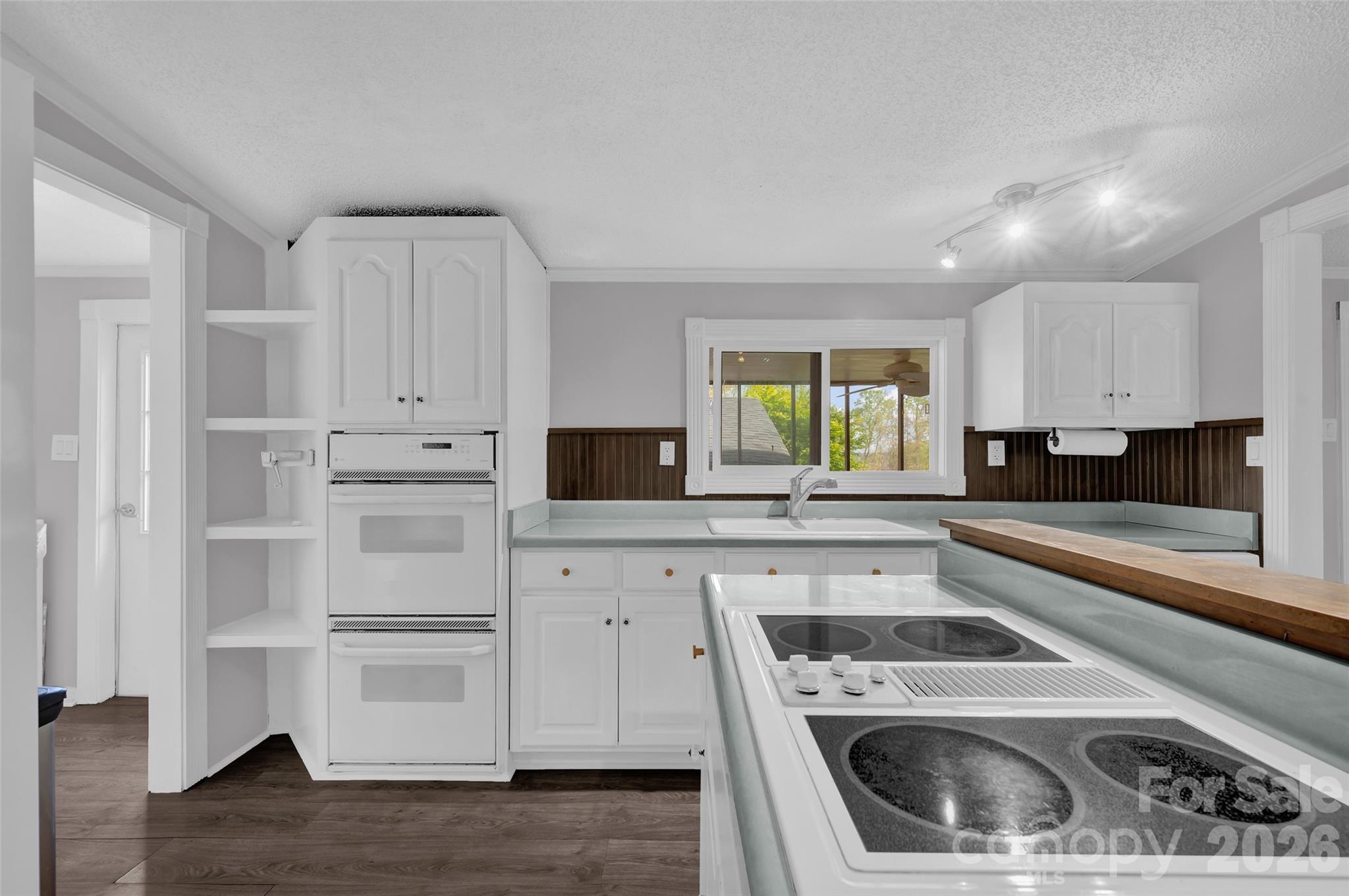 5708 Harwell Road Catawba, NC 28609 - Photo 4 of 31 a kitchen with white cabinets and appliances