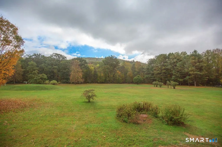 67 Middlefield Road Chester, MA 01011 - Photo 7 of 24 a lake view with beach