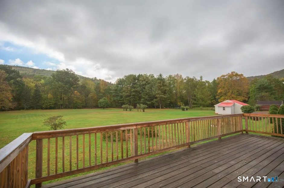 67 Middlefield Road Chester, MA 01011 - Photo 8 of 24 a view of a balcony with wooden floor
