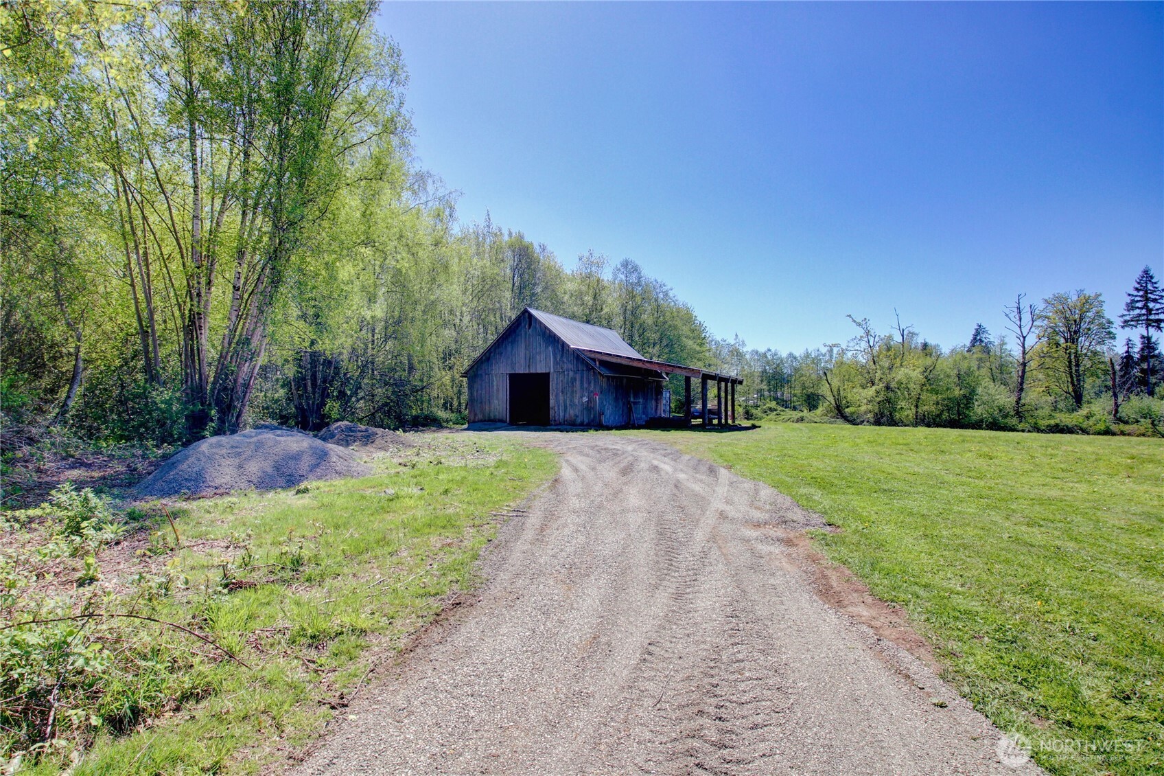 5730 Brookings Road Sedro-Woolley, WA 98284 - Photo 32 of 35 a view of house with backyard and garden