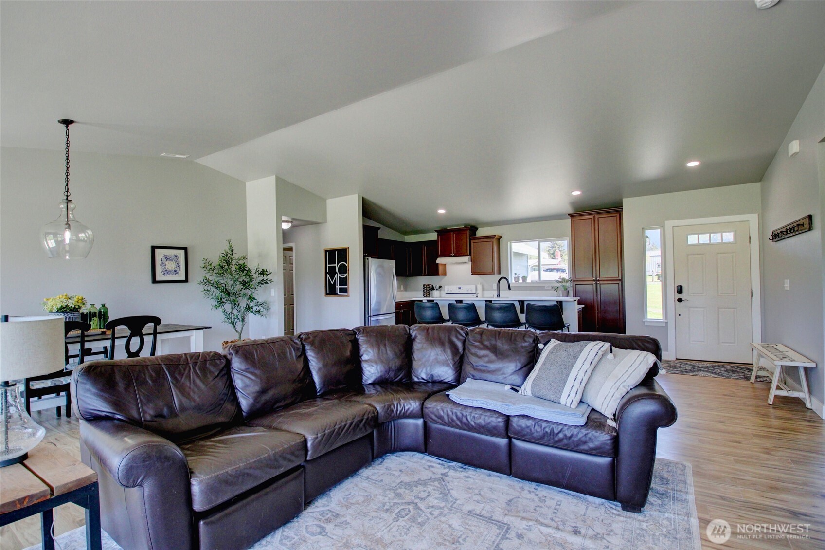 5730 Brookings Road Sedro-Woolley, WA 98284 - Photo 9 of 35 a view of a living room kitchen and a wooden floor