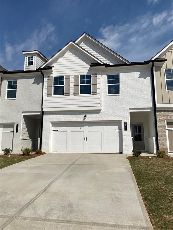 5366 Fox Den Road Oakwood, GA 30566 - Photo 1 of 1 a front view of a house with a yard